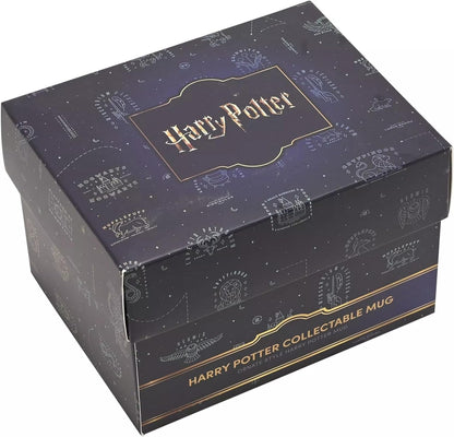 A dark navy blue and black gift box for the Harry Potter Collectable Mug, featuring gold foil branding and wizard-themed illustrations on a clean white background.