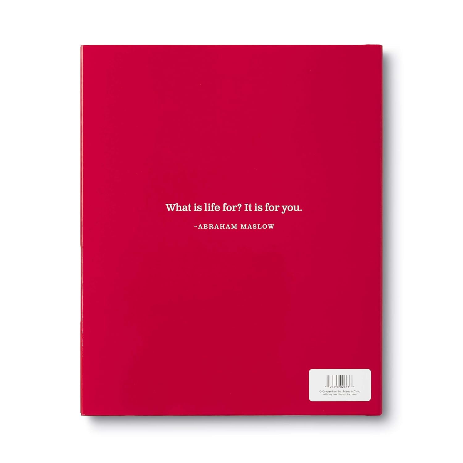 Red book with white text on a white background