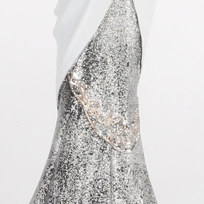 Silver sequin dress on a white background