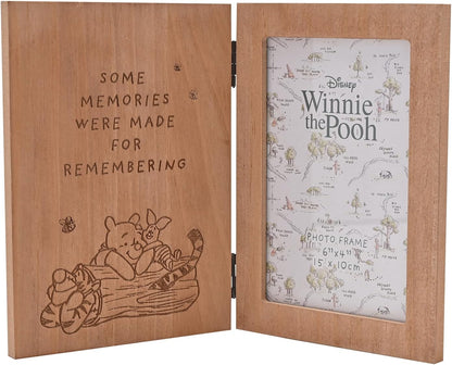 Wooden photo frame with engraved text and illustrations, featuring a map inside.