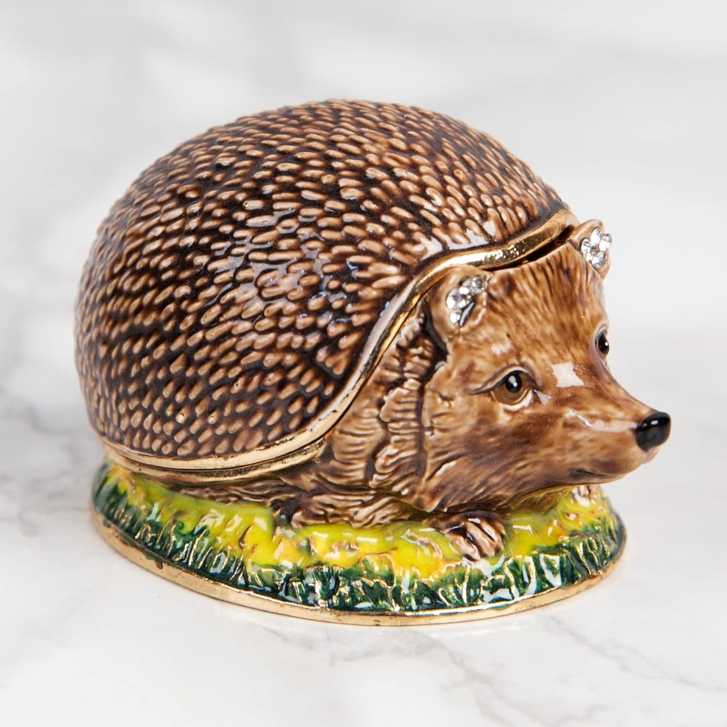 Decorative hedgehog-shaped object on a white background