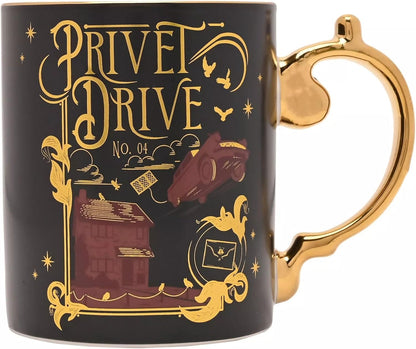A black ceramic mug with a gold handle and gold 'Privet Drive No. 04' lettering, featuring a gold and burgundy illustration of the Forbidden Forest house and car.