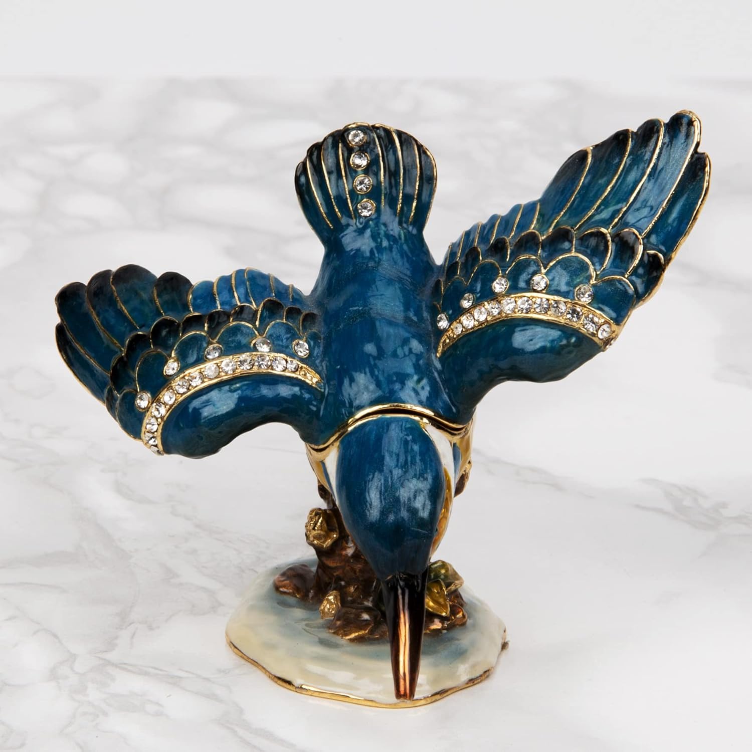 Decorative figurine of a bird with blue and yellow colours