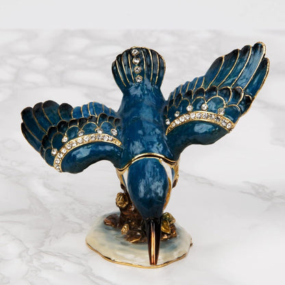 Decorative figurine of a bird with blue and yellow colours