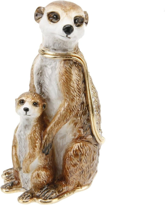 Statue of two meerkats on a white background