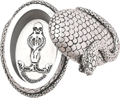 Silver trinket with snake design and 'Morsmordre' engraving on a white background