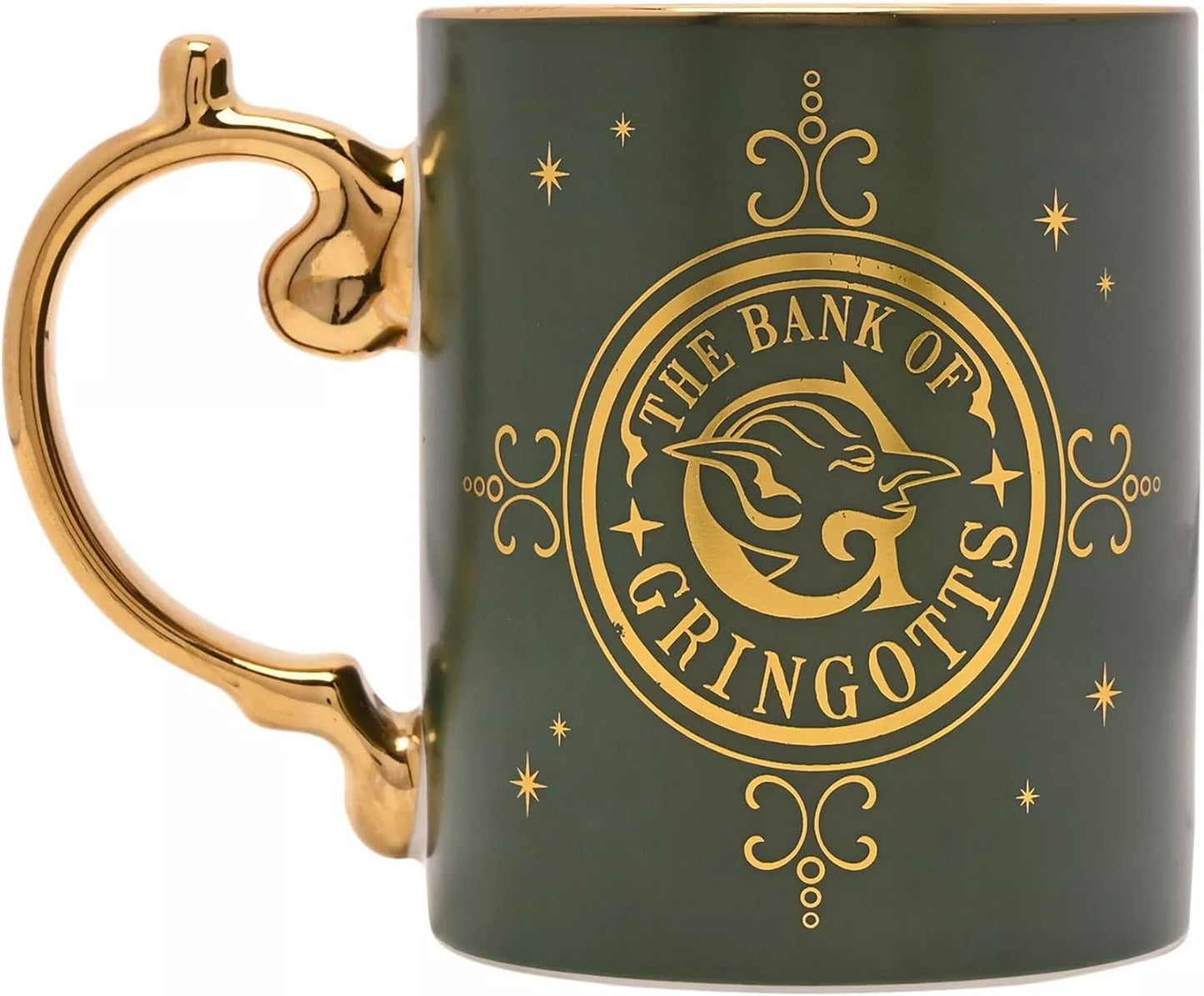 A dark green ceramic mug with a metallic gold handle and gold printed graphics, featuring the 'The Bank of Gringott' logo from The Lord of the Rings franchise.