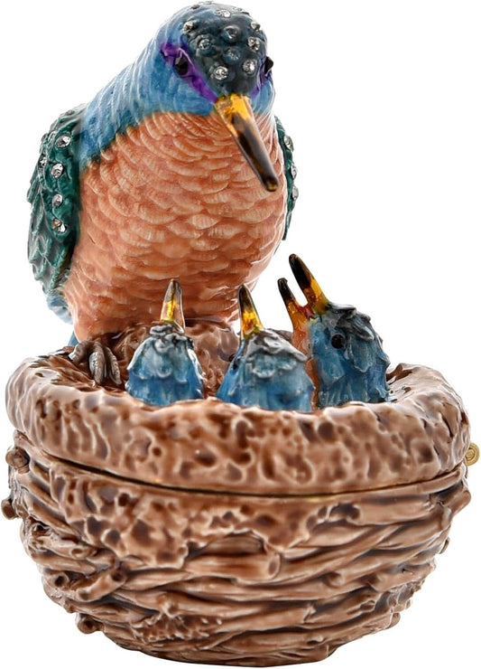 Decorative figurine of a bird with chicks on a nest