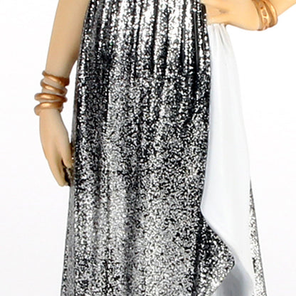 Silver sequin skirt worn by a mannequin on a white background