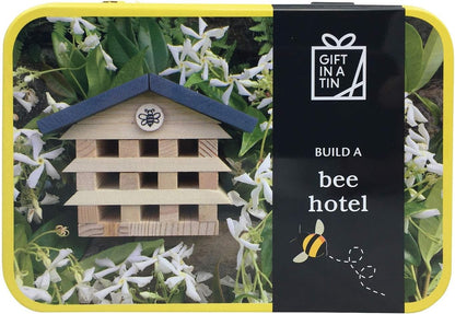 Gift in a tin packaging with a bee hotel model and floral design