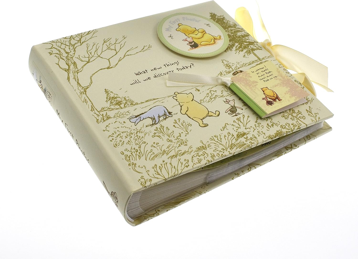 Decorative book with Winnie the Pooh illustrations on a white background