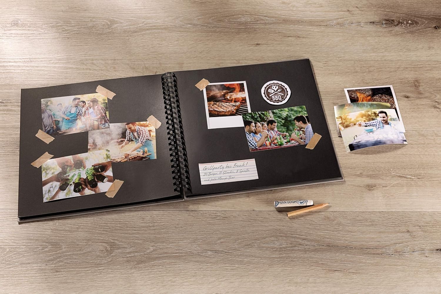 Open photo album with family photos on a wooden surface