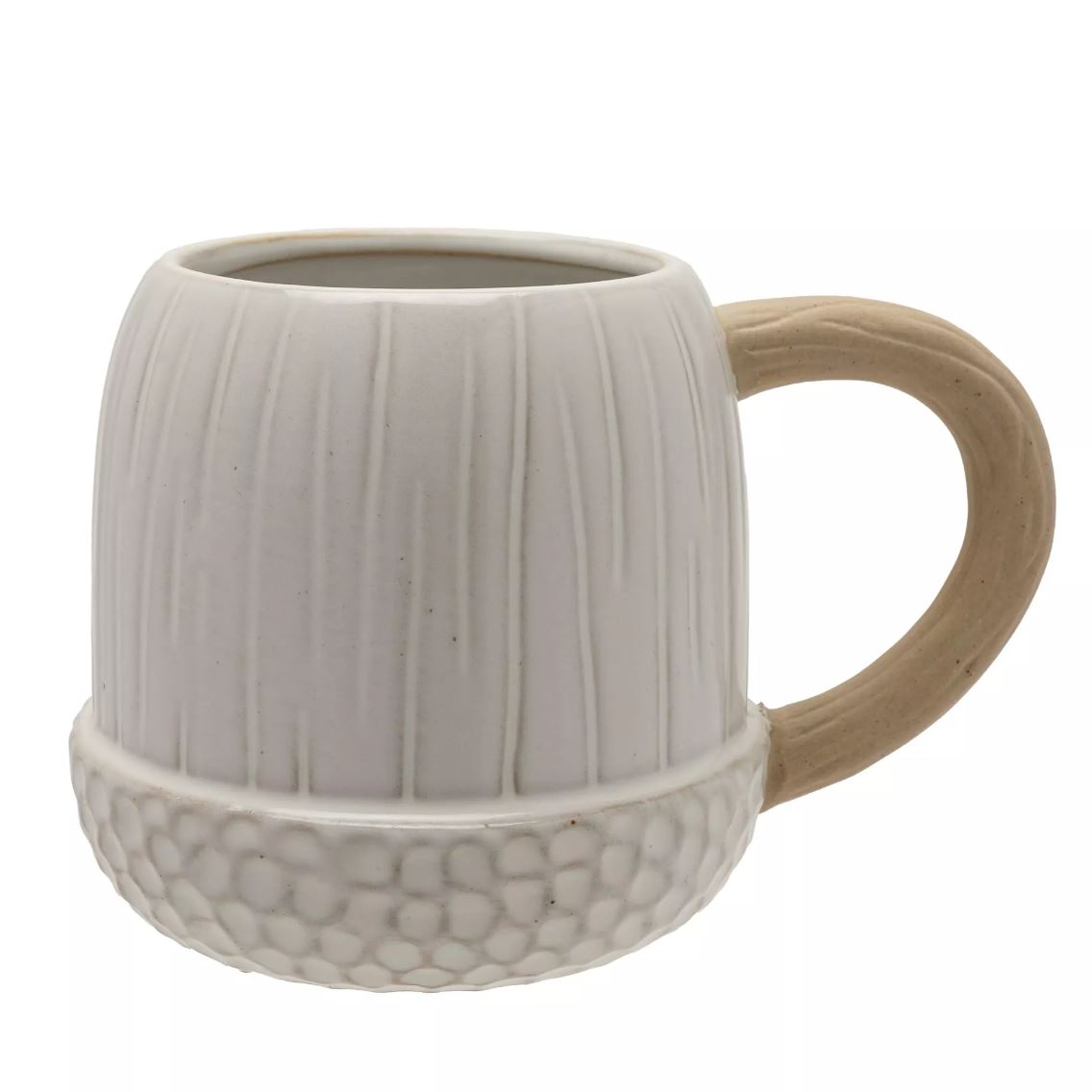 Ceramic mug with textured design on a white background - looks like an acorn
