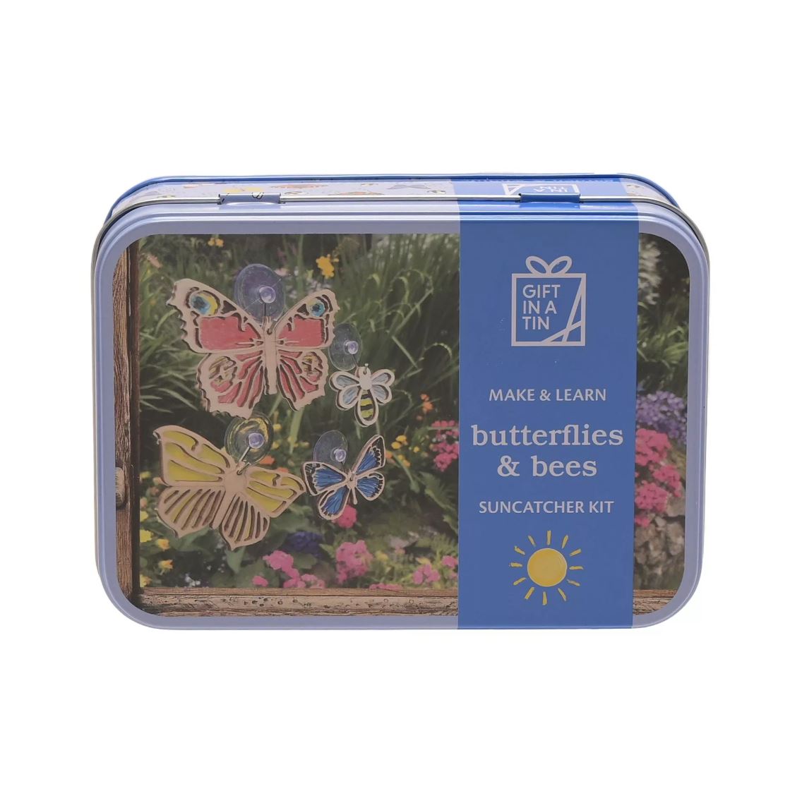 A rectangular metal gift tin for a butterfly and bee suncatcher kit, featuring a blue label on the right side and colorful butterfly illustrations on the left, shown against a plain white background.