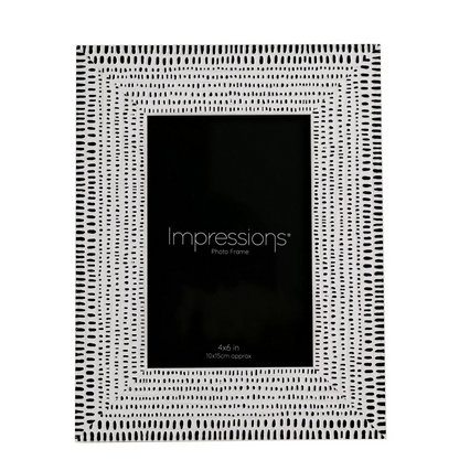 Black and white patterned photo frame with 'Impressions' branding on a white background