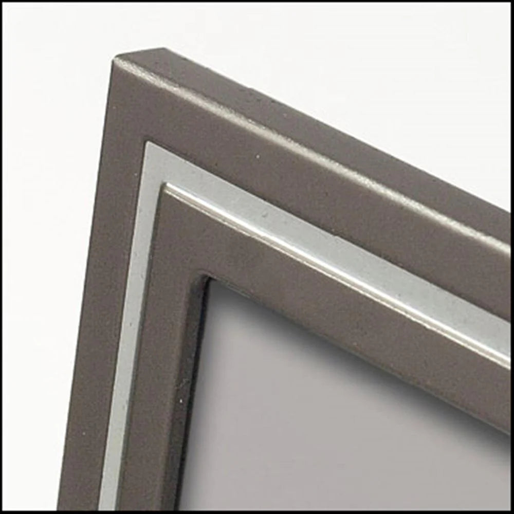 Close-up of a metal frame corner on a white background