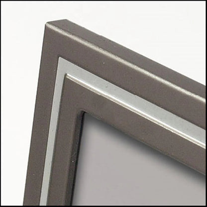 Close-up of a metal frame corner on a white background