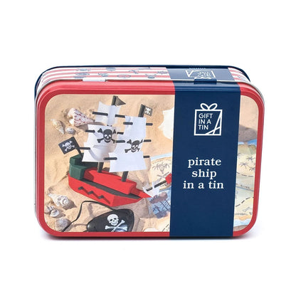 Pirate ship toy in a tin with decorative packaging on a white background