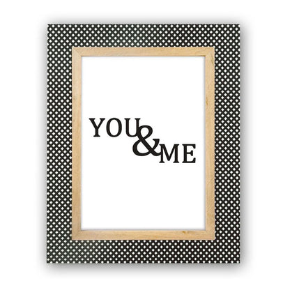 Framed artwork with 'YOU & ME' text on a polka dot background