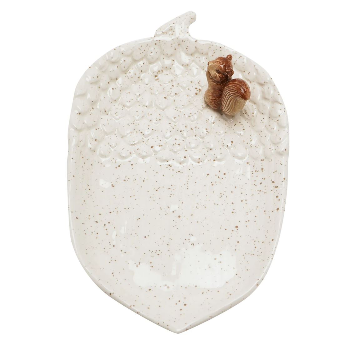 An off-white ceramic dish shaped like an acorn, featuring a textured surface with brown speckles and a small 3D squirrel decoration on the upper right side, set against a plain white background.