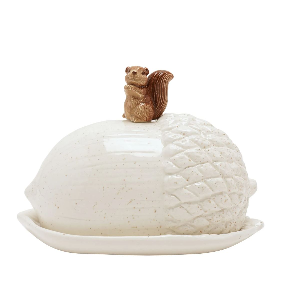 A ceramic butter dish shaped like a nut, with a textured off-white body, a matching lid, and a small brown squirrel figurine on top, set against a plain white background.