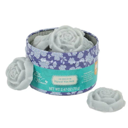 Rose-shaped wax melts in a decorative tin with floral pattern