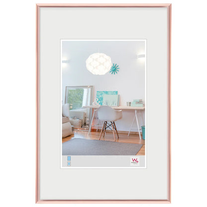 Framed picture of a modern living room with a rose gold frame.