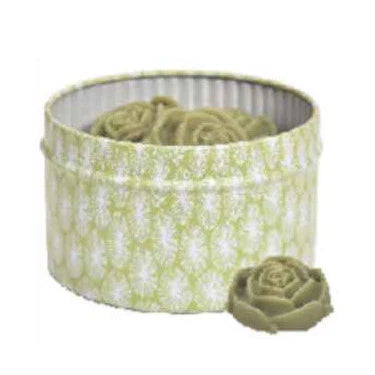 Green floral-patterned fabric roll with a matching flower on a white background