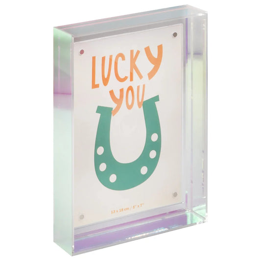 A clear acrylic block frame featuring a white insert card with the words 'LUCKY YOU' in orange and a green horseshoe graphic, shown on a white background.