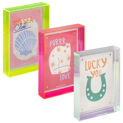 a set of 3 photo frames yellow pink and clear