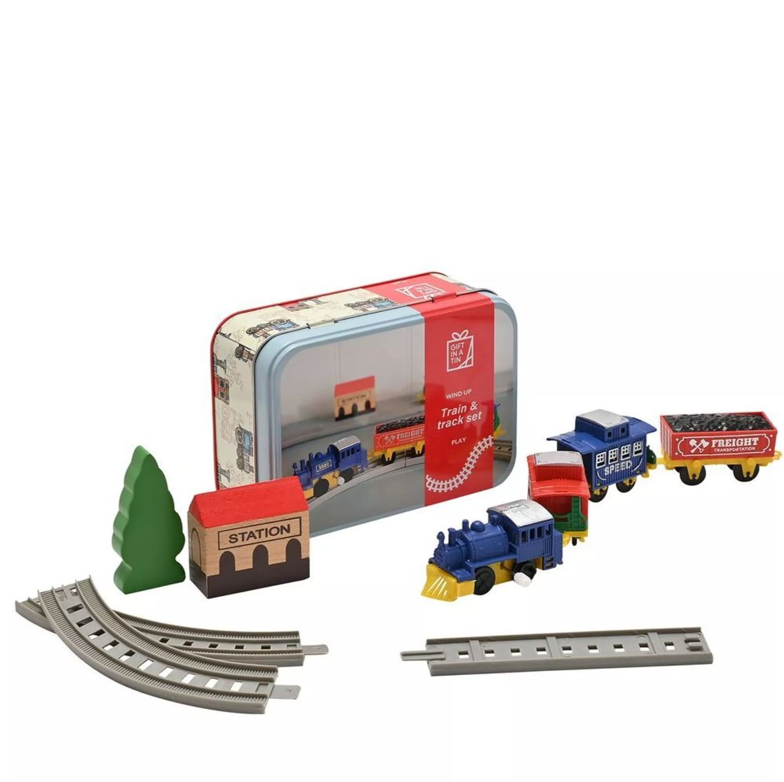 Toy train set with tracks and tin box on a white background